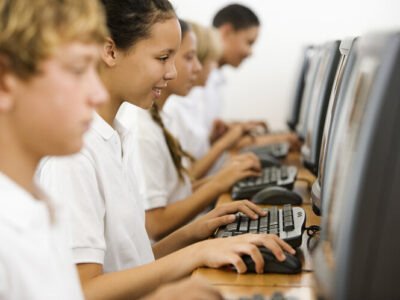School children sat on computers
